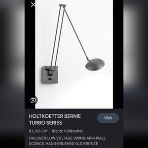 Swing arm wall sconce